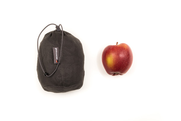waterproof trousers packed next to apple
